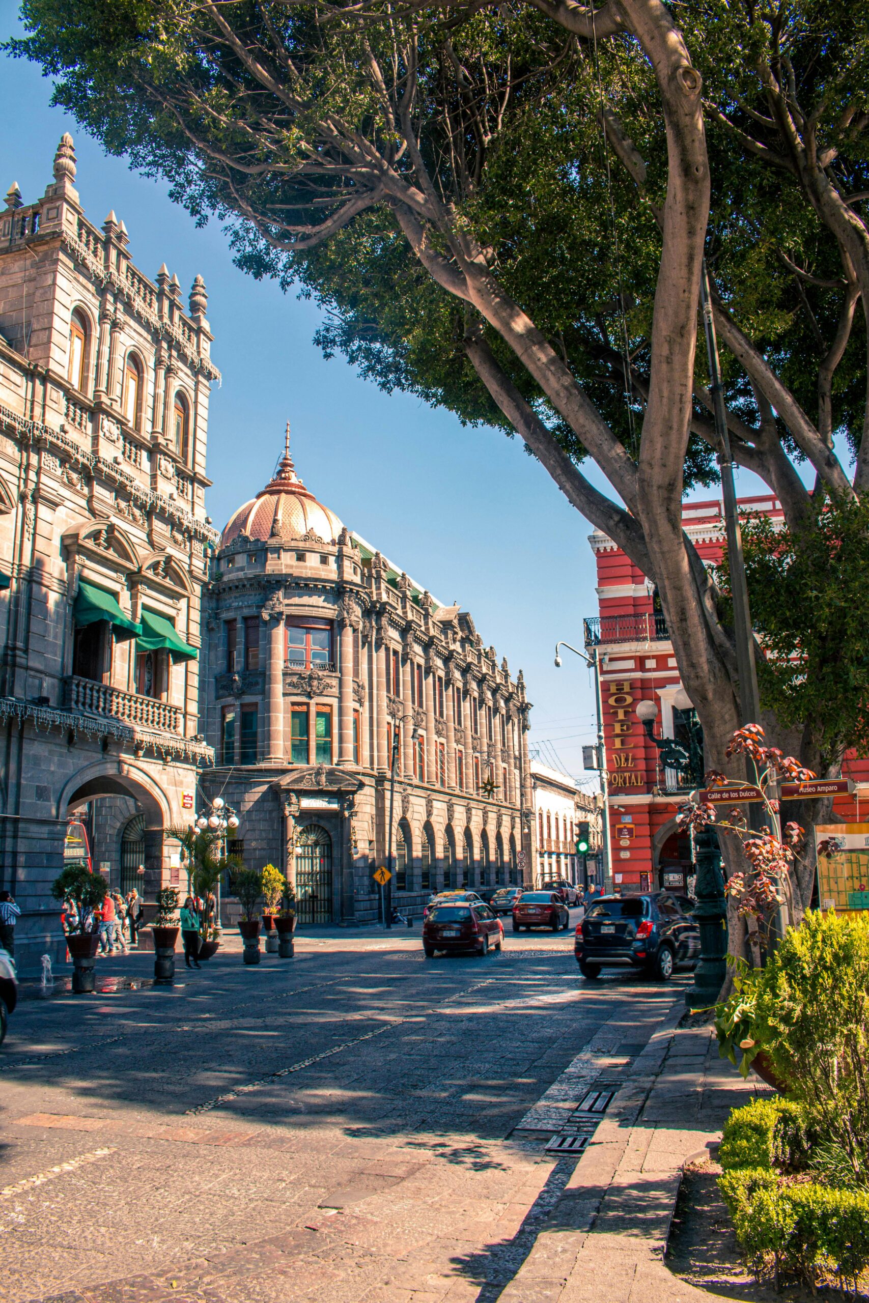 Street view of historic Puebla architecture in a vibrant cityscape.