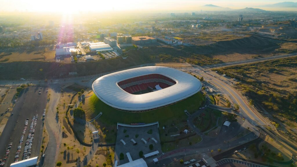 Captivating aerial shot of Estadio Akron in Zapopan, Mexico during sunset.